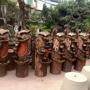 Thác nước phong thủy gốc cây